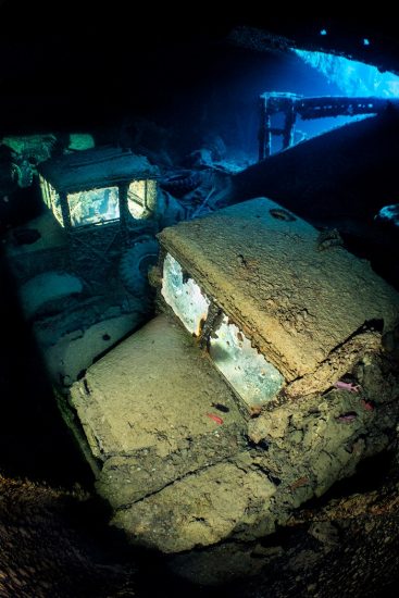 Three Albion AM643 Zwicky aircraft refueller trucks, with remote lighting, on the lower level of Hold 1 of the wreck of the SS Thistlegorm. Sha'ab Ali, Red Sea. Sinai, Egypt.